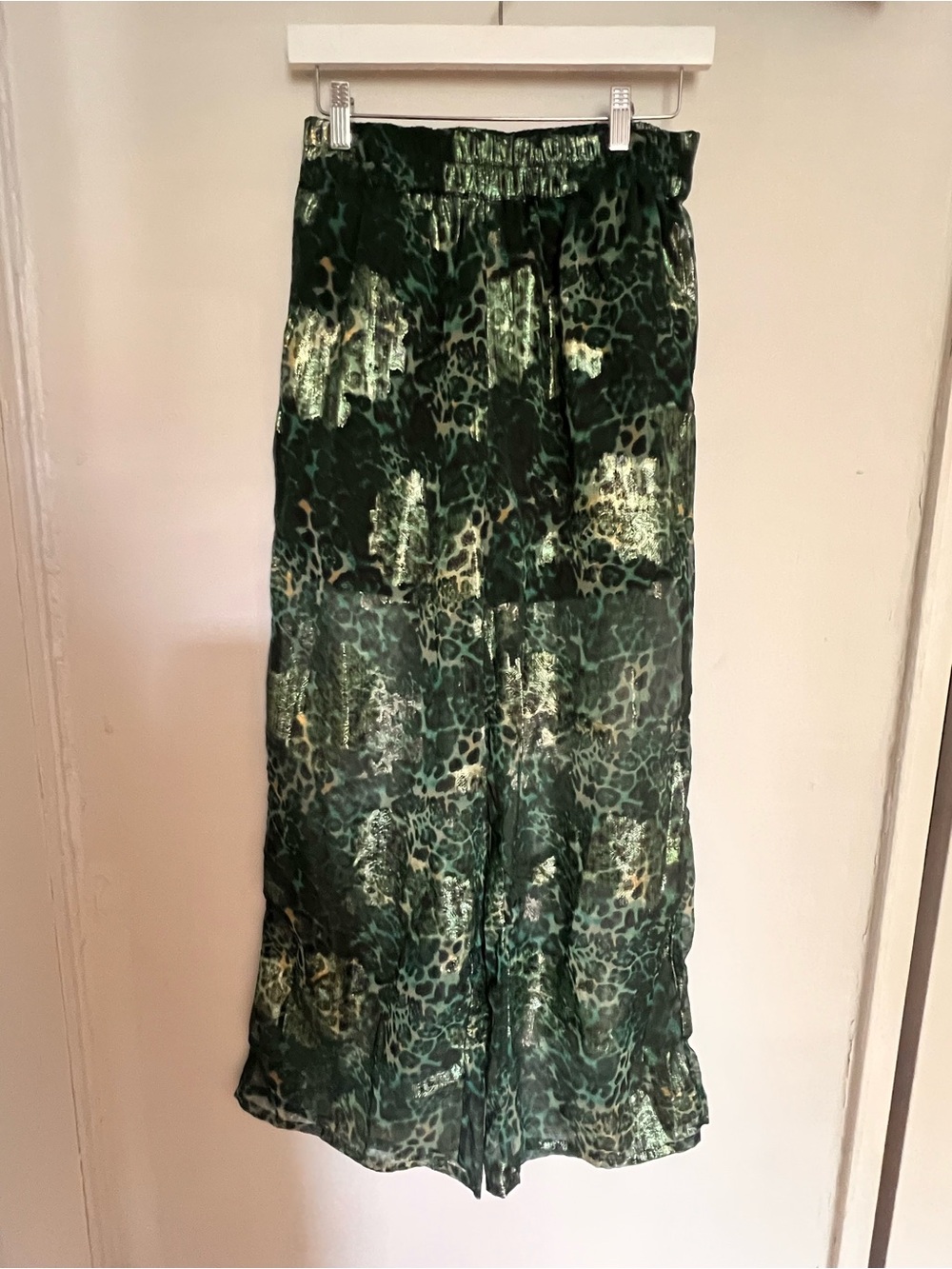 Green Animal Print Pants. Lined with shorts. Sheer from the mid thigh down